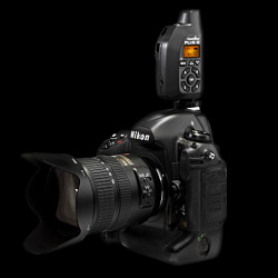 PocketWizard Plus III transceiver: on a Nikon camera, front angle view