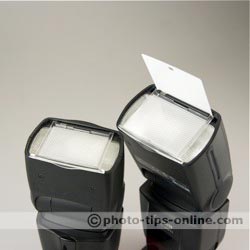 Canon Speedlite 430EX II vs. Canon Speedlite 580EX II: built-in white reflector card