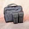 LumoPro LP739 Double Flash Speedring Bracket: carrying case next to Canon pouches