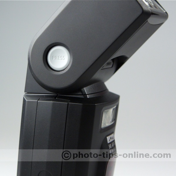 Metz Mecablitz 58 AF-1 flash: head release button depressed