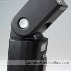 Metz Mecablitz 58 AF-1 flash: head release button depressed