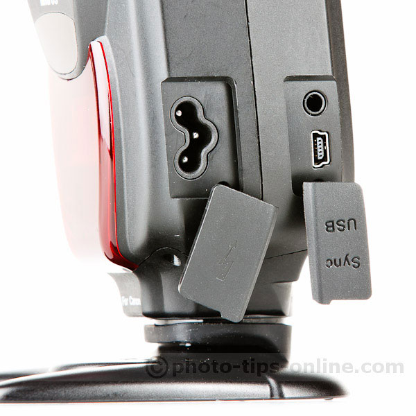 Phottix Mitros flash: high-voltage battery port, miniphone socket, USB port