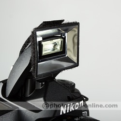 Promaster Universal Softbox for built-in flash: mounting base attached to a built-in flash